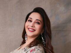 PHOTO: साडी विथ बॅकलेस ब्लाऊजमध्ये माधुरी दीक्षितने वेधलं लक्ष; पाहा फोटो!