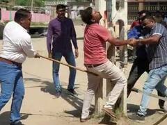 'आरोपियों को खंभे से बांधकर पीटना अधिकारों का उल्लंघन', एमनेस्टी ने गुजरात पुलिस के एक्शन को बताया कानून का अनादर