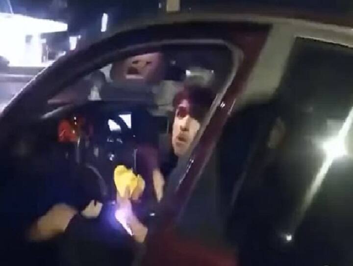 US boy eating burger in car shot at multiple times by policeman; watch shocking video பர்கர் சாப்பிட்ட சிறுவன் மீது துப்பாக்கிச் சூடு நடத்திய போலீஸ்: வெளியான அதிர்ச்சி வீடியோ