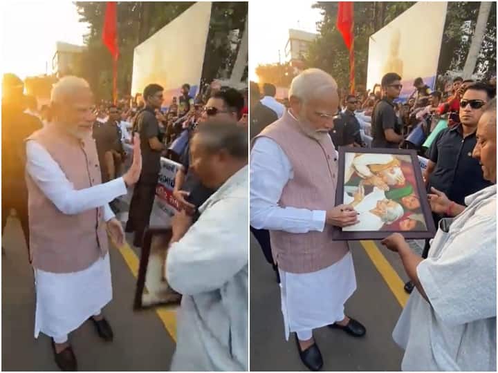 Viral Video PM Narendra Modi got down from his car to accept peoples greetings Jamnagar Gujarat- Watch Watch Video: जामनगर में लोगों के बीच गए पीएम मोदी, मां हीराबेन और अपनी तस्वीर पर दिया ऑटोग्राफ