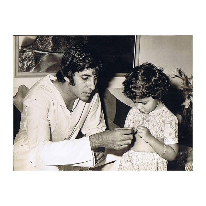 The father-daughter duo having fun as they spend time together.