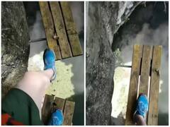 पहाड़ों पर बादलों के ऊपर चलता दिखा शख्स, दिल की धड़कनें बढ़ा देगा वीडियो