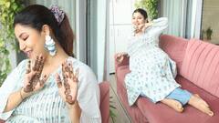 হাতে ভালবাসার মেহেন্দি, দ্বিতীয় সন্তানের জন্য অপেক্ষার মধ্যেই কাটছে দেবিনার করবা চৌথ