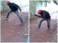 सफाई करने के दौरान शख्स के पीछे पड़ा सांप, प्रैंक देख उड़ जाएंगे होश