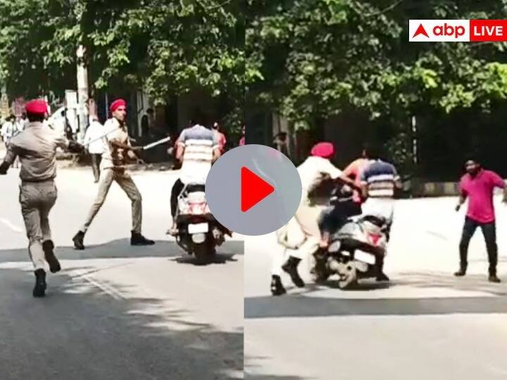 Bihar News: ये कहां का नियम! बिना हेलमेट देख पुलिस ने पीठ पर सटाक से मारी लाठी, सड़क पर गिरे युवक, VIDEO Bihar News: Police Hit the Scooty back with stick as Two People Were Going Without Helmet Video Getting Viral ann Bihar News: ये कहां का नियम! बिना हेलमेट देख पुलिस ने पीठ पर सटाक से मारी लाठी, सड़क पर गिरे युवक, VIDEO