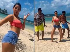 क्रॉप टॉप और शॉर्ट्स पहन नोरा ने समंदर किनारे किया जबरदस्त डांस, एक-एक मूव से नहीं हटेगी नजर