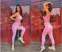 Neha Malik : 'फिटनेस फ्रिक' नेहा मलिकचा ग्लॅमरस अंदाज, स्पोर्ट्स वेअरमधील फोटो केले शेअर