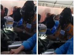 हवाई जहाज में सिलाई मशीन चलाते नजर आया शख्स, वीडियो देख उड़े होश