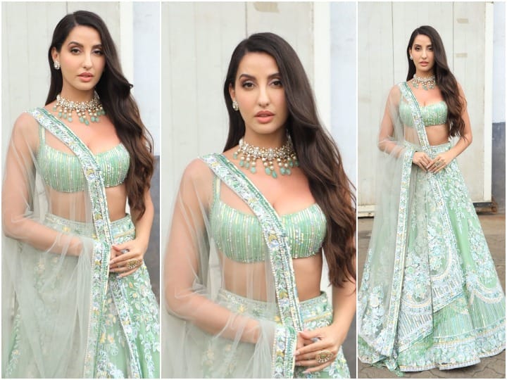 Nora Fatehi Photos: ‘झलक दिखला जा’ के सेट से डांसर और अभिनेत्री नोरा फतेही (Nora Fatehi) की तस्वीरें सामने आई हैं. एक्ट्रेस लहंगे में बेहद ही ग्लैमरस लुक फ्लॉन्ट कर रही हैं.