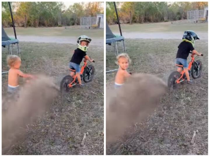 Big brother was seen blowing soil on his brother with an electric bicycle Video: इलेक्ट्रिक साइकिल से भाई पर मिट्टी उड़ाते दिखा बड़ा भाई, दिल जीत लेगा वीडियो