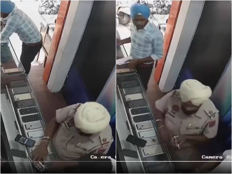 Punjab Cop suspended For Accidentally fires at mobile shop employee, Amritsar,  Watch Video Punjab Cop suspended: పుసుక్కున అలా కాల్చేశారేంటి సారూ- వైరల్ వీడియో!