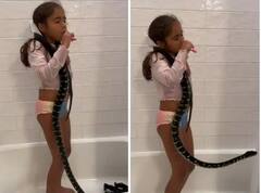 Video: ਸੱਪ ਨੂੰ ਗਲੇ 'ਚ ਲਪੇਟ ਕੇ ਬਰੱਸ਼ ਕਰਦੀ ਨਜ਼ਰ ਆਈ ਬੱਚੀ, ਵੀਡੀਓ ਦੇਖ ਹੈਰਾਨ ਰਹਿ ਜਾਵੋਗੇ