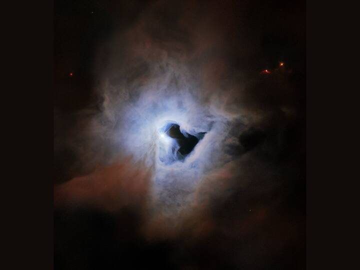 This is an image of NGC (New General Catalogue of Nebulae and Clusters of Stars) 1999, a reflection nebula in the constellation Orion, captured by the Hubble Space Telescope. The nebula appears like a 'cosmic keyhole'. When light from a star is reflected off neighbouring clouds of interstellar dust, a reflection nebula is created. The Orion Nebula is the closest region of massive star formation to Earth. NGC 1999, which lies near the Orion Nebula, is around 1,350 light-years from Earth. NGC 1999 is composed of debris left over from the formation of a newborn star. (Photo: ESA/Hubble and NASA)