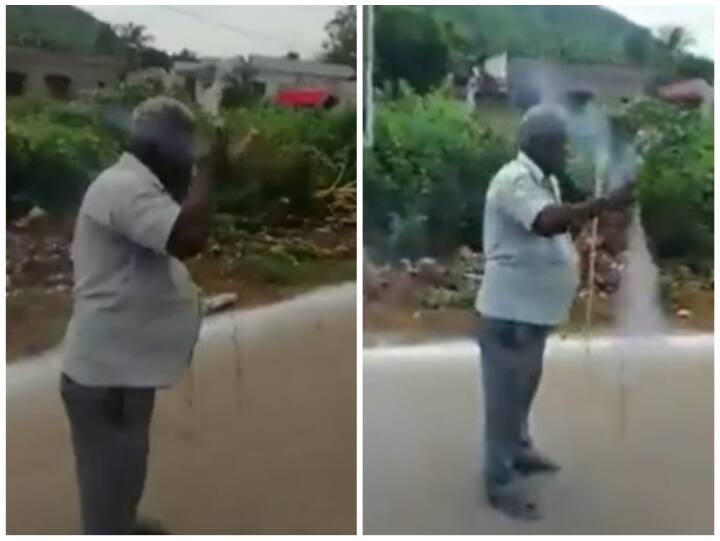Elderly man lit a rocket with a cigarette On Diwali Celebration बुजुर्ग पर चढ़ा दीवाली का खुमार, सिगरेट से जलाकर उड़ा दी रॉकेट
