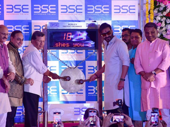 Bollywood actor Ajay Devgn and other senior BSE officials during the Opening Bell ceremony during the Diwali Muhurat Trading at the BSE on Monday evening.