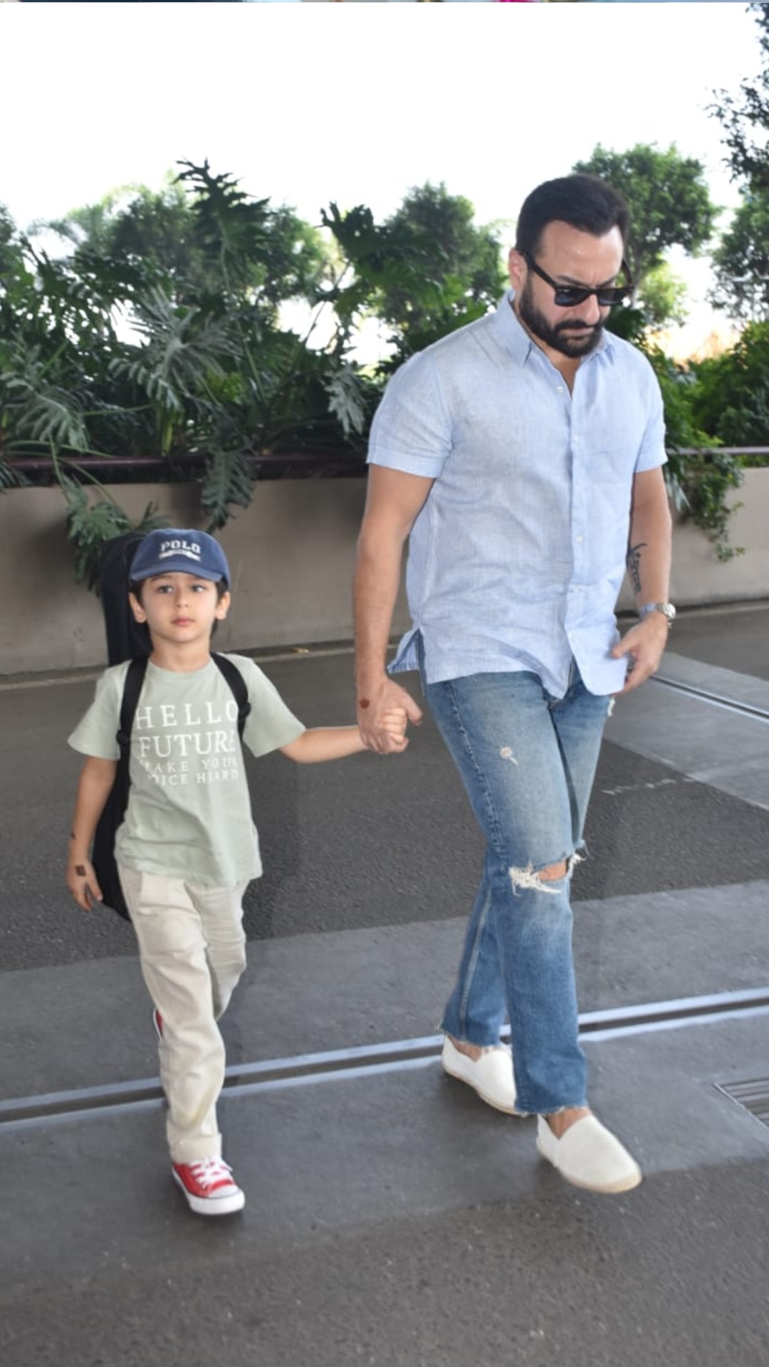 Aishwarya Rai holds Aaradhya's hand as she makes her way out of the airport  with husband Abhishek Bachchan – See pics