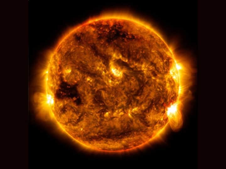 NASA's Solar Observatory Captures The Sun 'Smiling' Back At Earth. See PIC NASA's Solar Observatory Captures The Sun 'Smiling' Back At Earth. See PIC