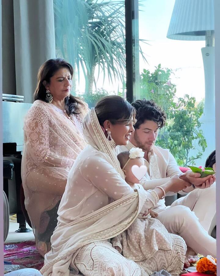 अभिनेत्रीने शेअर केलेल्या या फोटोंमध्ये हे जोडपे पूजा करताना दिसत आहेत, त्यासोबत ते आपल्या मुलीला हातात पकडून फोटो पोज देताना देखील दिसत आहेत.