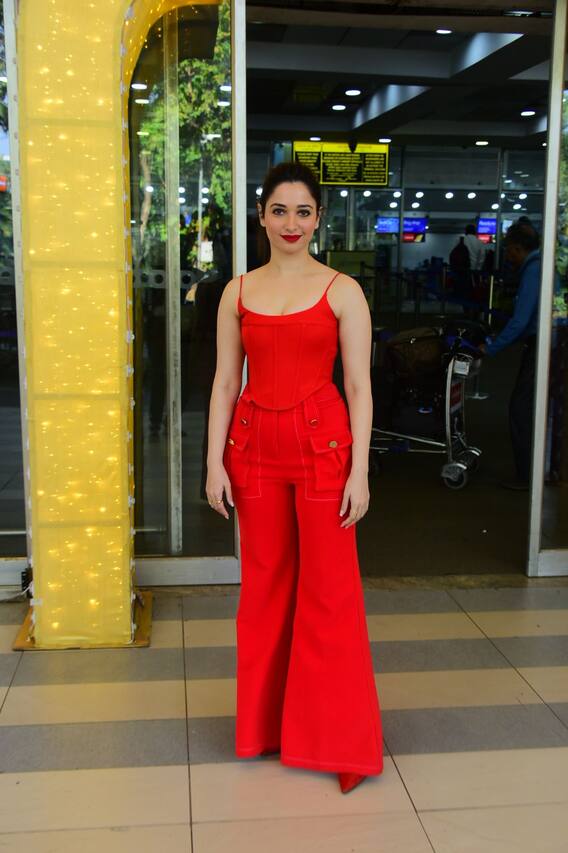 বিমানবন্দরে লাল পোশাকে তমন্না ভাটিয়া