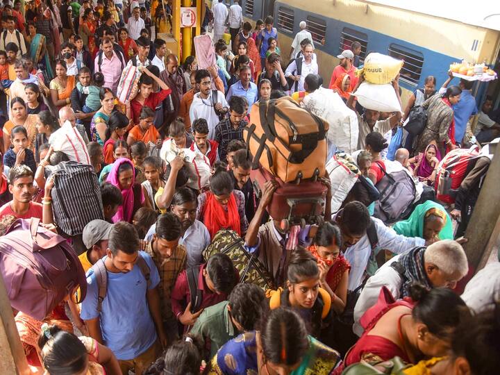 Crowded Patna Junction railway station as people leave for their hometown for the upcoming 'Chhath Puja', in Patna, Thursday, Oct. 27, 2022.