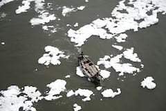 Chemical Sprayed On Toxic Foam In Yamuna River Ahead of Chhath Puja — IN PICS