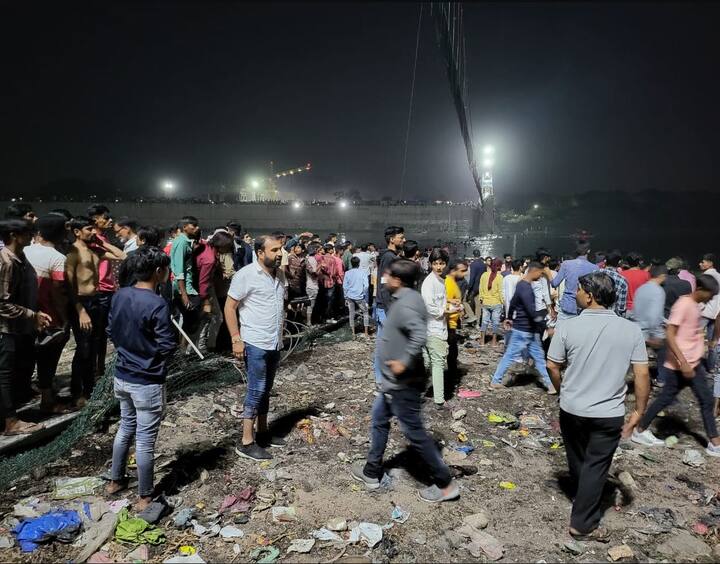 Morbi Cable Bridge Collapses PHOTO: મોરબી ઝુલતા પુલ તૂટતા સર્જાયેલી દુર્ઘટનામાં જેમના પરિવારજનો ફસાયા હોય કે ગુમ થયા હોય તેમની જાણકારીની જિલ્લા કલેકટર કચેરી દ્વારા એક ટેલિફોન નંબર જાહેર કરવામાં આવ્યો