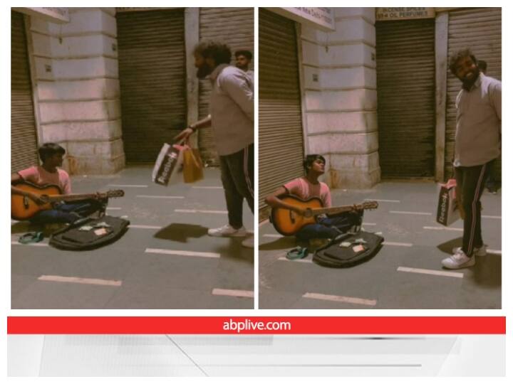 Boy sitting on Roadside Playing Guitar won heart on social media Video: सड़क किनारे बैठे बच्चे ने गिटार बजाकर जीता दिल, वायरल हो रहा वीडियो