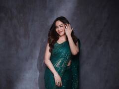 PHOTO: हिरव्या रंगाच्या साडीत माधुरी दीक्षितच्या ग्लॅमरस अदा; चाहते झाले फिदा!