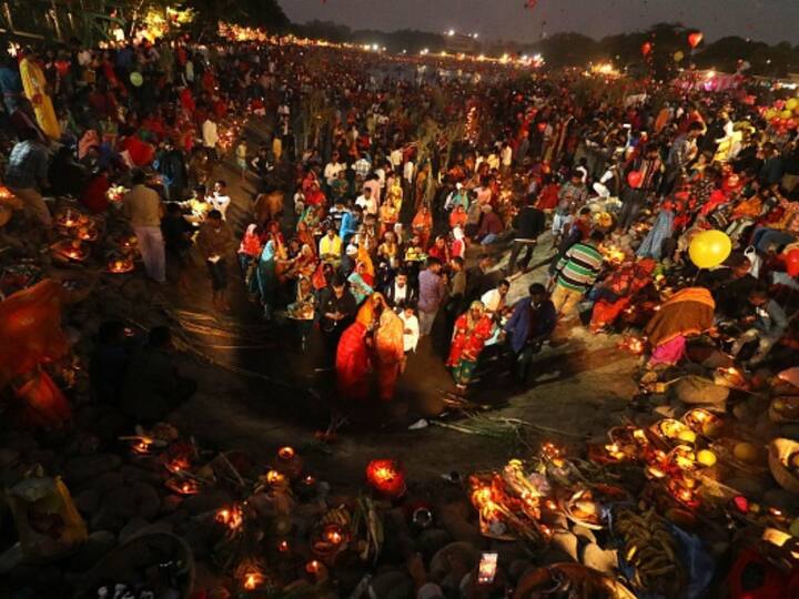 Devotees take part in a ritual to worship the sun during the Hindu festival of Chhath Puja at a lake in Chandigarh. (Source: AFP)