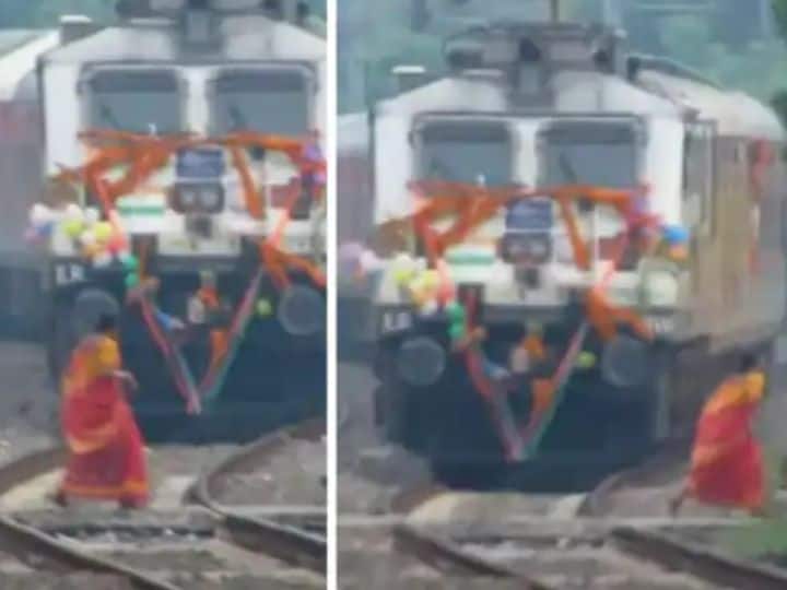 Viral Video marathi news woman crossing railway line in front of high speed train Viral Video :  'काळ आला, पण वेळ नव्हती' आपल्याच नादात रेल्वे क्रॉसिंग ओलांडत होती, पुढे काय घडले तुम्हीच पाहा