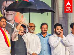 Rajinikanth in Karnataka : ரஜினிக்கு குடைபிடித்தது ஊழல்வாதியா? கொந்தளிக்கும் நெட்டிசன்கள்