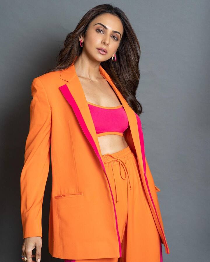 Rakul Preet glowed in an orange bralette and matching pantsuit. Rakul Preet Singh's pantsuit was a bold combination of orange and pink that made a statement.