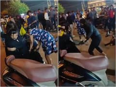 నడిరోడ్డుపై మహిళను చితకబాదిన యువతులు- వైరల్ వీడియో!