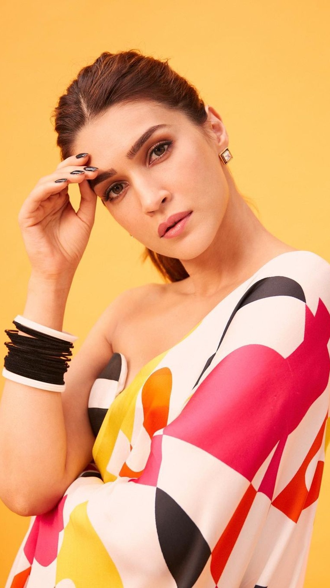 Kriti Sanon Adds A Colourful Twist To A Chiffon Saree Pairing A White &  Black Striped Bralette Blouse Which Would Make You Stand Out At Your BFFs  Engagement!