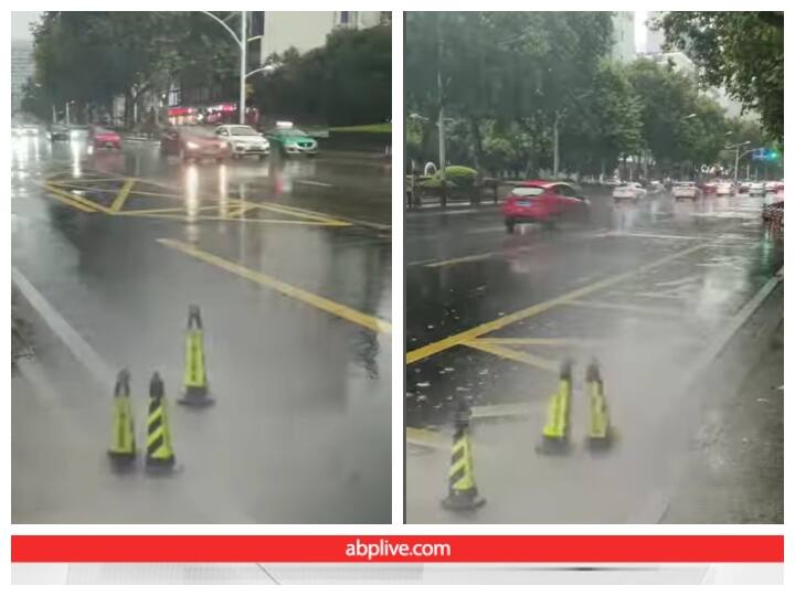 Traffic cones are seen swinging with strong gusts of wind during rain Video: बारिश और तेज हवा की चाल पर थिरकते नजर आए ट्रैफिक कोन्स, यूजर्स को भाया वीडियो