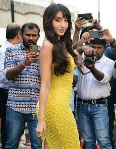 Nora Fatehi: નોરા ફતેહીએ યલ્લો આઉટફિટમાં ફિગર ફ્લોન્ટ કર્યું, જુઓ વાયરલ તસવીરો