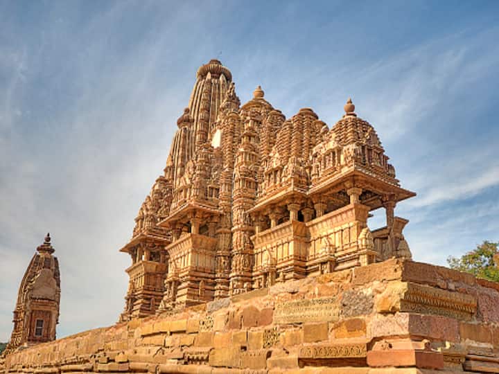The Khajuraho Complex of Temples, maybe the most famous historical temples in India, is a must-see on every visit to Madhya Pradesh, regardless of your interests. The complex contains multiple Hindu, Jain, and Buddhist temples that are famous for their sexual carvings and sculptures. The Khajuraho collection of temples is an important historical and cultural monument. This site is a UNESCO World Heritage Site because it is genuinely unique. (Image Source: Getty)