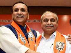 Gujarat Election 2022: गुजरात के पूर्व सीएम विजय रूपाणी और डिप्टी सीएम नितिन पटेल नहीं लड़ेंगे विधानसभा चुनाव