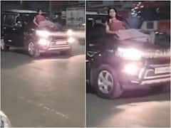 కదులుతున్న కారుపై కళ్లు చెదిరే స్టంట్- షాకిచ్చిన పోలీసులు!