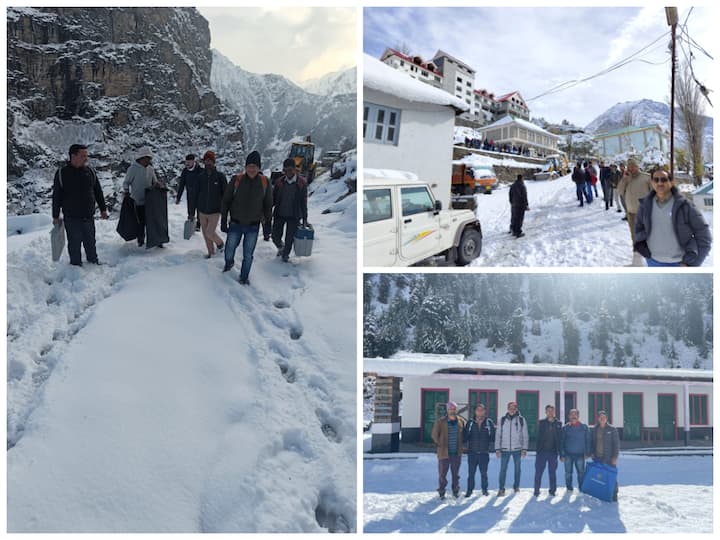 Polling officials walk on snow-covered roads to reach the polling booths set up for Himachal Assembly elections.