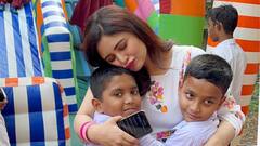 হাতে আঁকা রঙিন ট্যাটু, চকোলেট, বেলুনে খুদেদের শিশুদিবস সাজিয়ে দিলেন ঋতাভরী