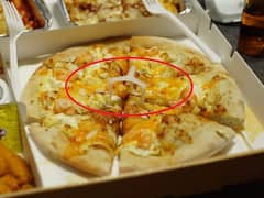 పిజ్జాలో చిన్న ప్లాస్టిక్ టేబుల్ ఉంటుంది! ఎందుకో తెలుసా?