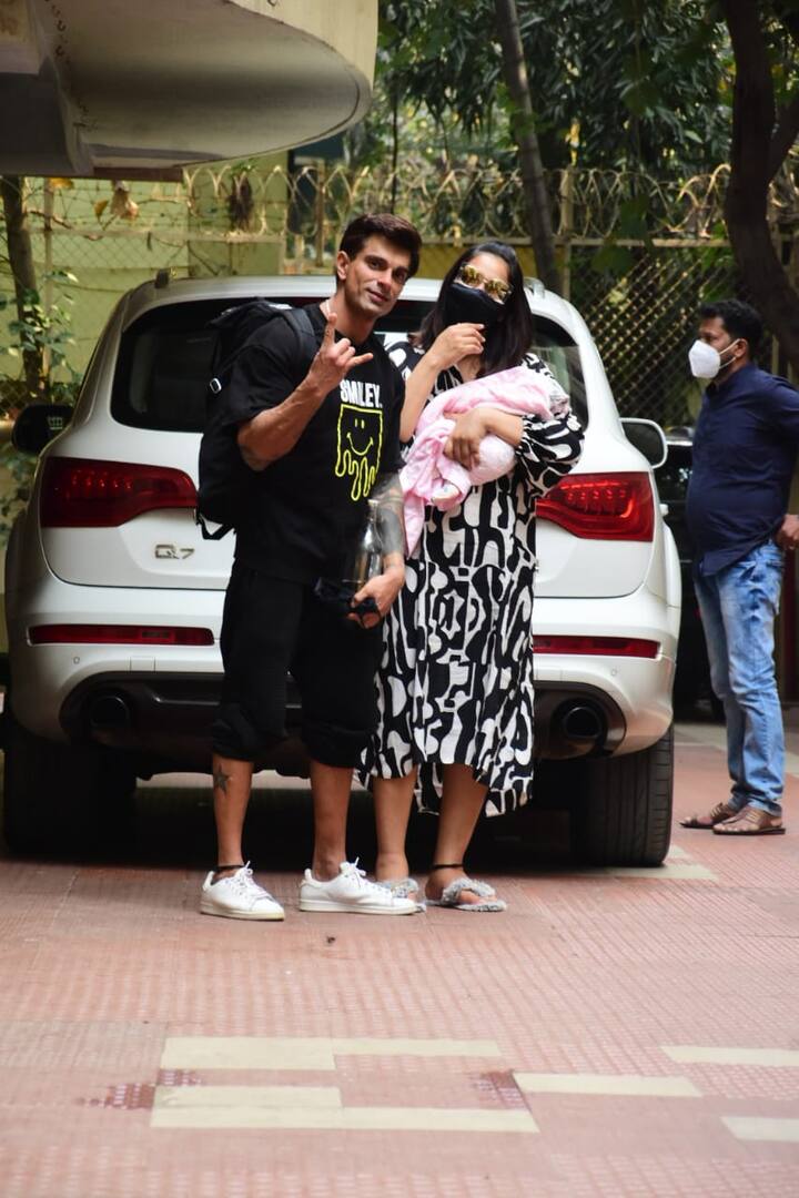 Karan Singh Grover also struck a pose with his wife and daughter.