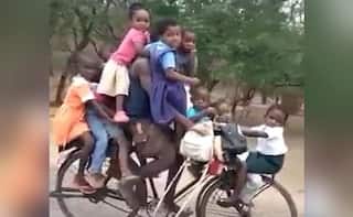 Viral Video: ਸਾਈਕਲ 'ਤੇ 9 ਬੱਚਿਆਂ ਨੂੰ ਸਕੂਲ ਲਿਜਾਣ ਵਾਲੇ ਵਿਅਕਤੀ ਦੀ ਵੀਡੀਓ ਹੋਈ ਵਾਇਰਲ, ਯੂਜ਼ਰਸ ਨੇ ਦਿੱਤੀ ਮਜ਼ਾਕੀਆ ਪ੍ਰਤੀਕਿਰਿਆਵਾਂ