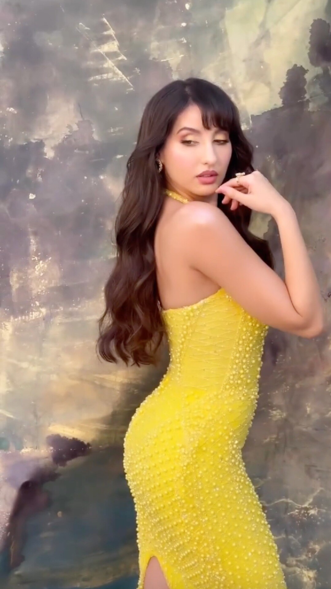 Nora Fatehi pairs sexy neon yellow bodycon dress with ₹3 lakh bag for shoot