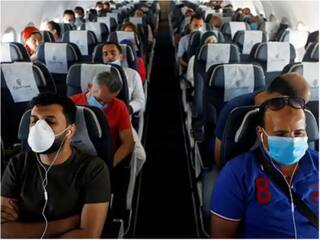 Air Travel Covid Guidelines: માસ્કને લઇને સરકારનો મોટો નિર્ણય, વિમાનમાં મુસાફરી કરનારા મુસાફરો માટે જાહેર કરી એડવાઇઝરી
