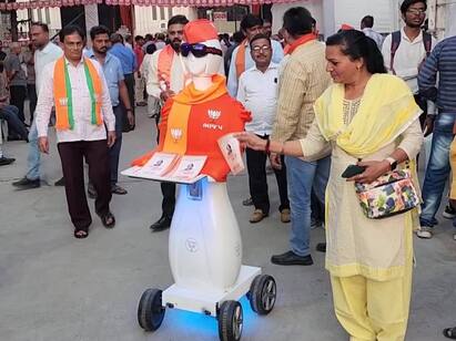 Digital Robot In Gujarat Campaign Ahead Of Assembly Polls in nadiad district Digital Robot Campaign: இந்தியாவிலேயே இதுதான் முதல்முறை.. ரோபோட்டை பயன்படுத்தி வாக்கு சேகரித்த பாஜகவினர்..