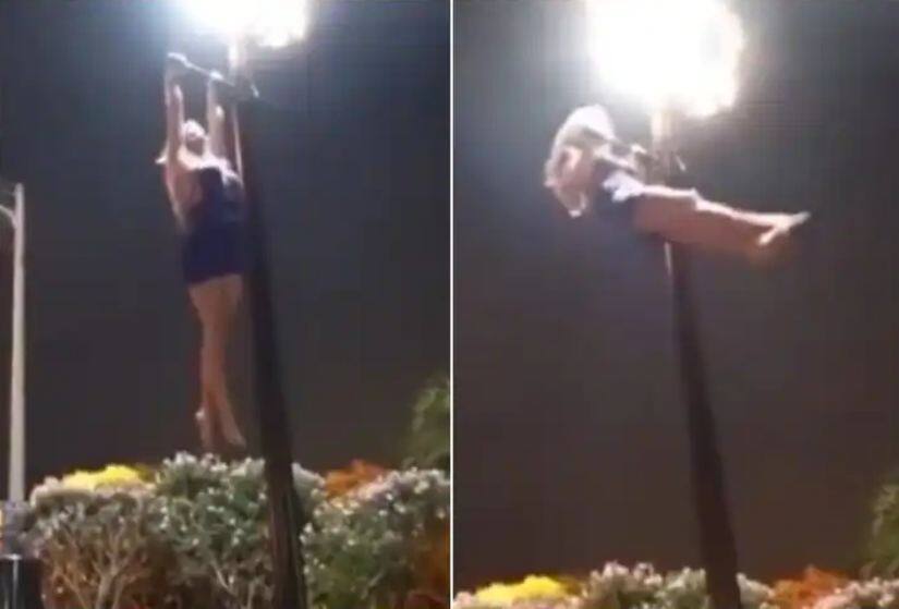 girl is seen doing pull ups on an electric pole Amazing Video: ਇਹ ਹੁੰਦੀ ਹੈ ਫਿਟਨੈੱਸ... ਦੇਖੋ ਕਿਵੇਂ ਖੰਭੇ 'ਤੇ ਚੜ੍ਹ ਕੇ ਕੁੜੀ ਨੇ ਲਗਾਏ ਪੁਲ-ਅੱਪ