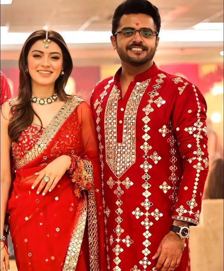 Both Hansika and Sohael chose red outfit for and twinned for the occasion. (Image: Instagram)