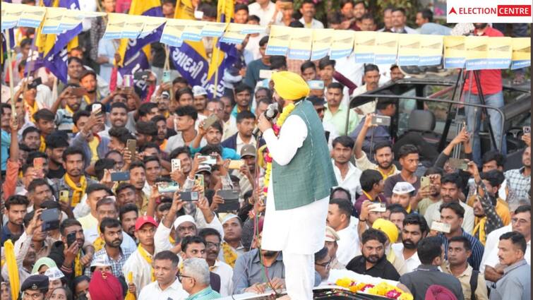 Punjab Chief Minister Bhagwant Man held a road show in Nandod Gujarat election 2022: દુકાનમાં ઝંડો ભાજપનો છે પણ મત ઝાડુને આપવાનું કહે છે આ વેપારી: ભગવંત માન